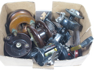 A wooden centre pin fishing reel 4", a Bakelite Modernite Pixe centre pin fishing reel 4", an Alvey chrome and Bakelite centre  pin fishing reel 4", a Penn 525 Mag fishing reel, an Intrepid Sea  Streak fishing reel and 1 other fishing reel