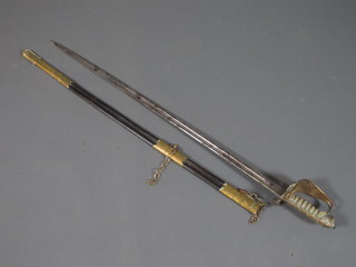 A Royal Naval Officer's sword by Gieve Matthews & Seagrove  complete with leather scabbard, marked R Mantaeu-Leeds RM