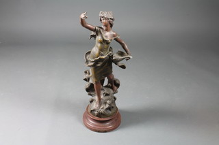 A 19th Century spelter figure of a standing classical lady with shell 28"