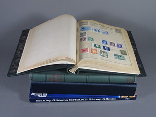 A Pelham album of stamps, a Triumph stamp album, a Meteor  album of stamps and a Stanley Gibbons standard stamp album