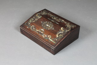 A mid Victorian rosewood and coromandel wood writing slope,  the split fall inlaid with cut brass work, mother of pearl and  abalone shell with quatrefoil cartouche to centre within scrolled  and foliate reserves, enclosing a fitted interior with inkwells and  concealed drawers 4.5"h x 14"w x 10.5"d