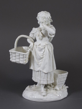 A 19th Century blanc de chine Continental porcelain figure of a standing girl with basket, R, 12"