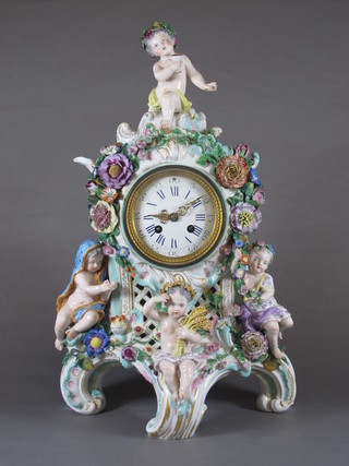 A Meissen cased French 8 day striking mantel clock with Roman numerals and enamelled dial contained in an allegorical porcelain  case depicting the four seasons, firing crack to base, with crossed  sword mark, 17"  ILLUSTRATED