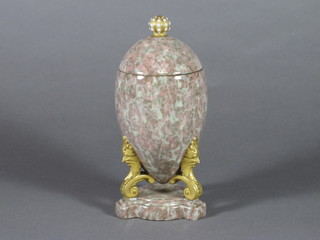 A Worcester marble glazed egg shaped urn and cover, raised on a circular base 6", some restoration and small chip to rim of body