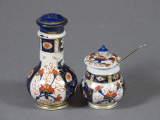 A MacIntyre Derby style 2 piece condiment set comprising  mustard pot - chip to lid 2" and a club shaped pepper pot 3.5" -  chipped