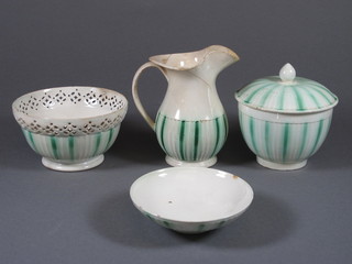 An 18th Century Leeds green and white striped cream jug 5" -  cracked, do. circular jar and cover 3" - chips to base and lid, a  circular sugar bowl with pierced border 5" and a shallow circular  dish 4"