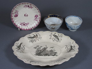 A Dr Wall Worcester blue and gilt patterned teabowl - chipped,  a blue and white teabowl, a Creamware saucer and an oval  Creamware dish decorated pheasants 10" - chipped and cracked