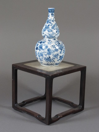 An Oriental blue glazed double gourd shaped vase, base with 4 character mark, raised on a square rosewood and marble stand 5"   ILLUSTRATED