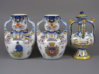 A pair of Quimper twin handled urns decorated coat of arms and  figure of a lady and gentleman, the base marked Rouen 1945  8.5" together with a Quimper 4 handled puzzle jug raised on a  spreading foot 9", base f and r,