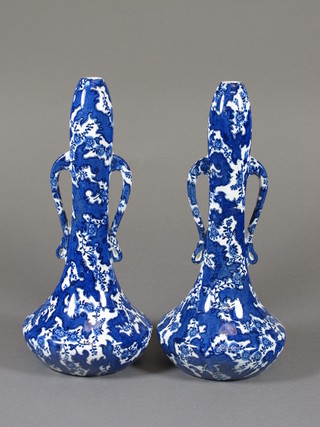 A pair of 19th Century Continental blue and white transfer decorated vases 10"