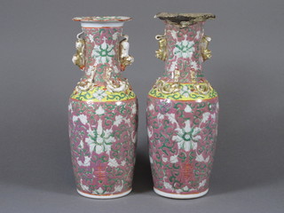 A pair of Canton pink glazed club shaped vases 10", 1 with rim  heavily restored