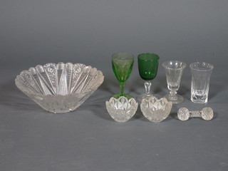 22 various Antique wine glasses, 3 circular cut glass dishes 9.5"  and 5", a pair of circular cut glass bowls 3", and a pair of cut  glass knife rests