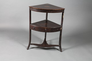 A George III mahogany corner wash stand, decorated bat wing patterae, fitted frieze drawer flanked by 2 faux fronted drawers,  raised on splayed legs 31.5"h x 22"w x 16"d