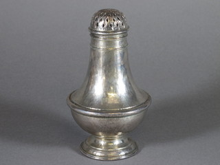 Omar Ramsden, an Arts & Crafts planished silver baluster shaped  sugar sifter raised on a spreading foot, London 1916 by Omar  Ramsden 7 ozs, 6.5"h, makers mark for Ramsden and Carr   ILLUSTRATED