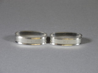 A pair of Georg Jensen oval silver napkin rings marked 22A, 2  ozs