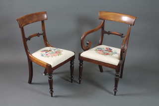 A set of 8 William IV mahogany dining chairs, 2 having arms  with scroll carved spars above Trafalgar seats decorated flowers  and song birds, raised on turned lapette carved tapered legs, peg  feet