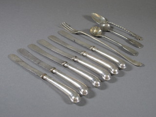 2 Victorian silver fiddle pattern mustard spoons, a silver pickle fork and 6 pistol grip silver handled tea knives