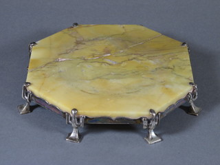Omar Ramsden, an Arts & Crafts octagonal veined marble and  silver mounted teapot stand, raised on square pad feet - 1  missing, by Omar Ramsden, London 1900, marble cracked, 6", makers mark for Ramsden and Carr 