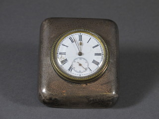 A silver cased travelling clock with enamelled dial, marks rubbed  3"