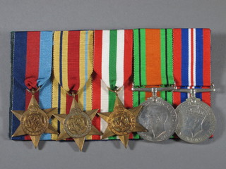 A group of 5 medals comprising 1939-45 Star, Africa Star, Italy Star, Defence and War medal, court mounted