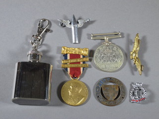 A WWII Defence medal, a George V LCC School Attendance  medal, an Air Gunners badge, etc
