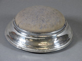 A circular silver dressing table jar incorporating a pin cushion,  6" Birmingham 1919