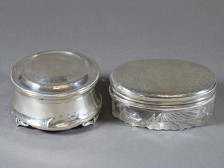 A Victorian oval cut glass dressing table jar - f with silver lid, London 1880 and a circular silver dressing table box with hinged  lid - f, 3.5"