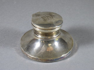 A circular silver capstan inkwell, Birmingham 1924, monogrammed, no liner, 3"diam