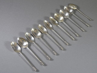 A set of 10 and 1 other seal end coffee spoons, Sheffield 1932,  London 1913, 7 ozs