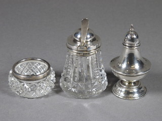 A silver baluster shaped pepperette 3", a cut glass mustard pot  with silver mount and a matching salt