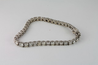 An 18ct bracelet set numerous diamonds, approx 11.25ct