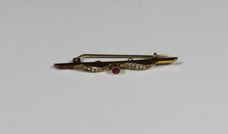 A 9ct gold bar brooch set pearls and red stone