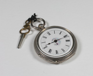 A lady's Continental open faced fob watch contained in a Continental silver case