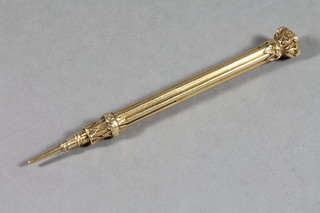 A Victorian gilt metal propelling pencil by Simpson 156 Leddon  Hall Street, London, top missing seal