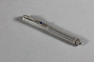 An early 20th Century French silver fountain pen marked 603,  set a cabouchon cut blue stone