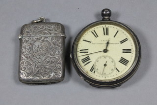 A Victorian engraved silver vesta case, Birmingham 1886 and an open faced pocket watch Mayes Railway Chronometer contained  in a silver case