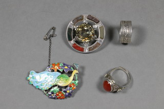 2 silver rings, a silver brooch set hardstones and an enamelled  brooch decorated a peacock