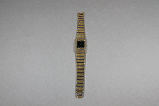 A lady's Raymond Weil 18ct 2 colour gold plated wristwatch  with integral bracelet