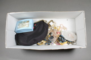 A lady's evening bag and a small collection of costume jewellery