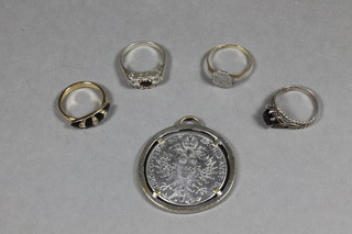 An 18ct gold dress ring set diamonds, 3 other dress rings and a  coin pendant