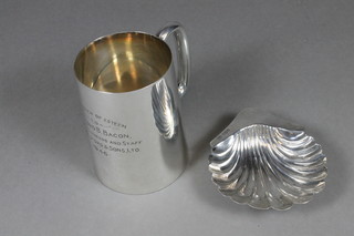 A silver tankard, Sheffield 1945 and a scallop shaped butter dish,  Sheffield 1906, 8 ozs