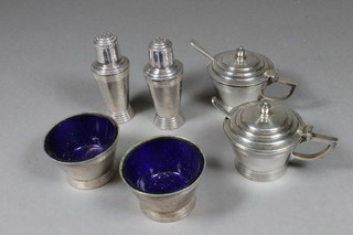 An Art Deco 6 piece cylindrical silver plated cruet comprising pair of mustard, pair of salts and 2 pepper pots by Mappin &  Webb
