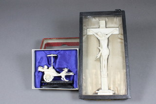 An Oriental carved ivory crucifix 7.5" and a carved rickshaw  figure group 3"