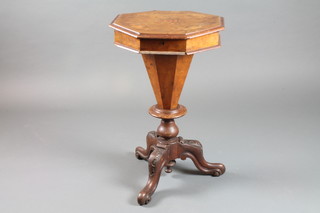 A Victorian walnut work trumpet table, the floral inlaid hinged top enclosing a fitted interior, raised on a tripod base 28"h x  17"w