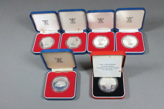 A 1977 Bailiwick of Jersey silver proof 25 pence piece, 4 others and a 1979 Government of Bhutan silver proof coin
