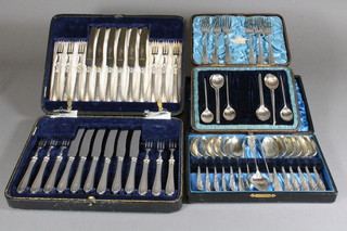 A set of 12 silver plated fruit knives and forks, a set of 12 silver  plated tea spoons, a serving spoon, pepper pot, sugar tongs, 6  silver plated Old English pattern forks and a set of 9 silver plated  coffee spoons, cased