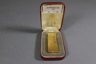 A Dunhill gold plated lighter