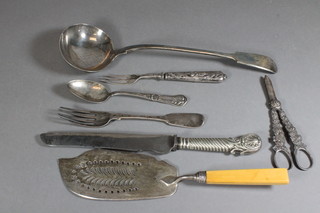 A William IV silver fiddle pattern fork, a silver plated fish slice,  a collection of plated items