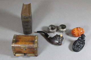 A carved pipe in the form of a buffalo, a pair of Eastern white metal salts etc