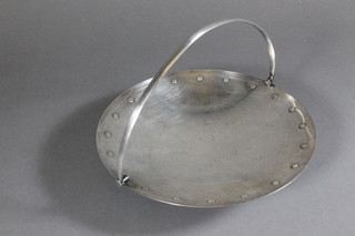 A circular silver plated pedestal cake basket 9"
